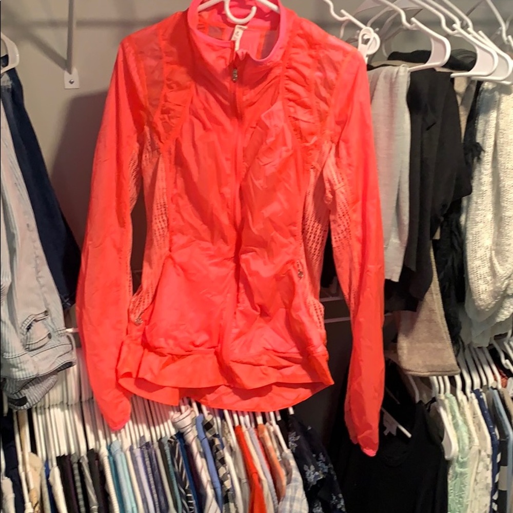 Never worn size 6 lululemon rain jacket